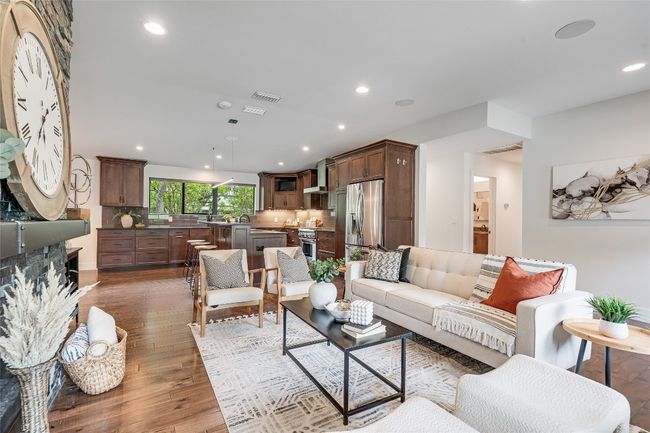 Featuring tastefully selected hardwood floors, LED recessed lighting, and neutral freshly paint ed intrior. | Image 14