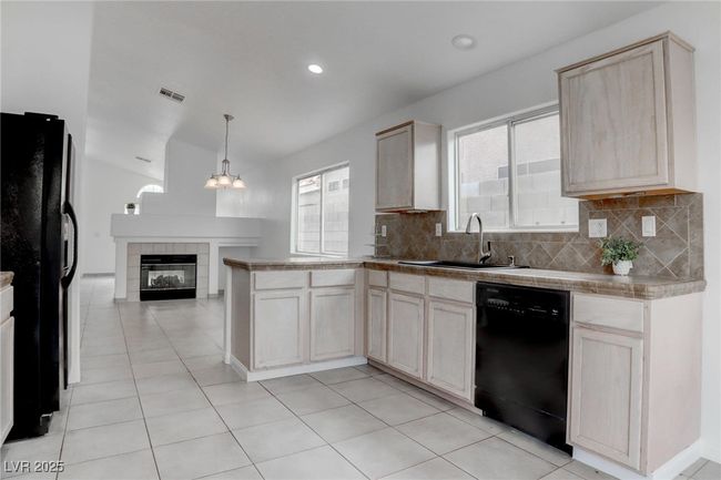 Kitchen featuring decorative backsplash | Image 14