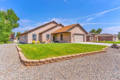 711 Cottonwood Circle, House other with 3 bedrooms, 1 bathrooms and 2 parking in Alamosa CO | Image 2