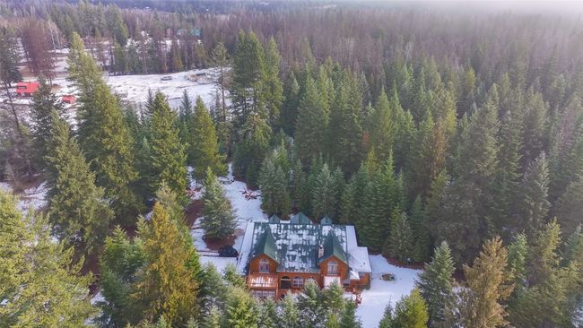 Birds eye view of property with a view of trees | Image 46