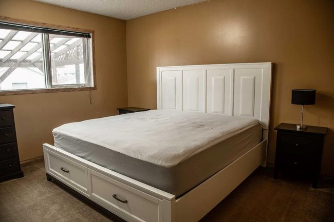 10513 106 Street, House other with 4 bedrooms, 2 bathrooms and 4 parking in High Level AB | Image 10