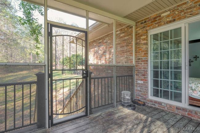 This porch is private to the main bedroom and has outside stairs | Image 41