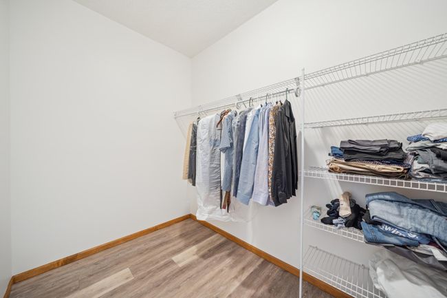 Large primary bedroom closet! | Image 30