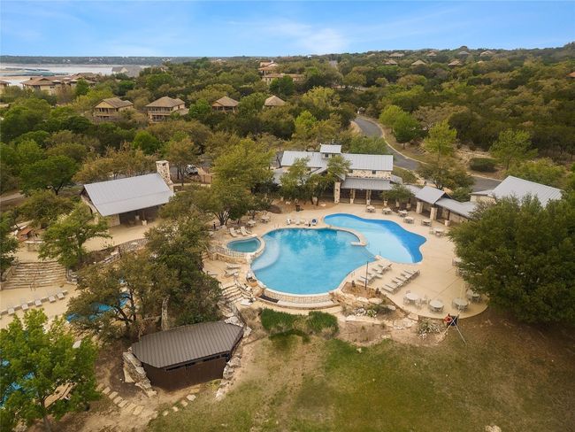 Sparkling community pools with a vast amount of space for outdoor gatherings and activities. | Image 37