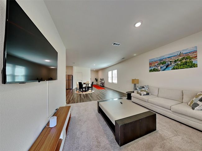 Living area featuring wood finished floors and recessed lighting | Image 7