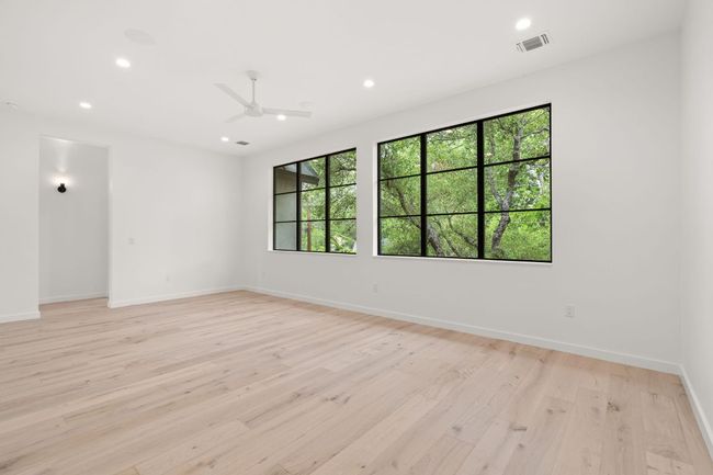 Large second floor living space that sits among the 3 secondary bedrooms. | Image 19