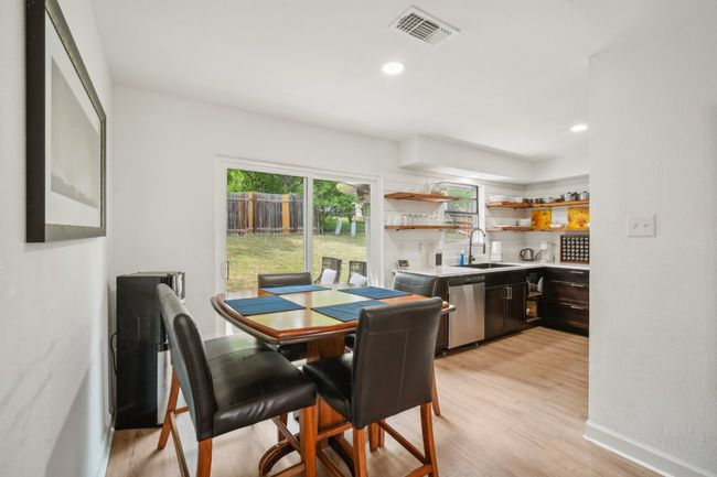 Looking into kitchen/dining area from hallway. | Image 6