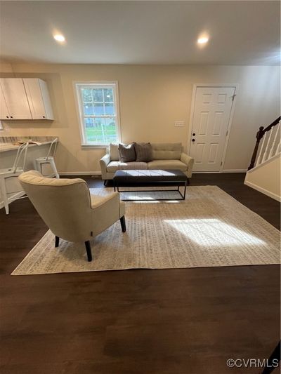 Living room with dark hardwood / wood-style floors | Image 3