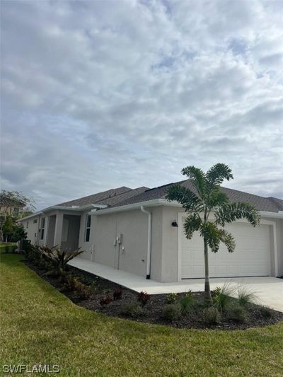 9099 Leatherwood Loop, Home with 2 bedrooms, 2 bathrooms and null parking in Lehigh Acres FL | Image 3