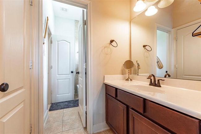 One of the Jack and Jill vanities with tile flooring. | Image 40