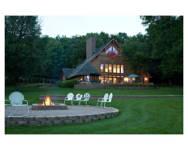 St Francis House: Cozy up to the warm fire after a long day on the lake | Image 91