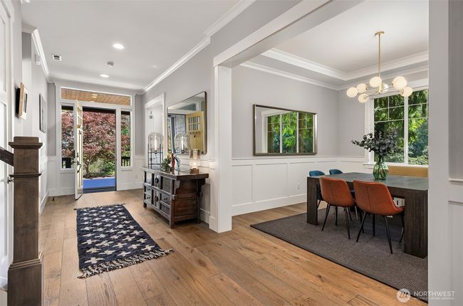 Off the great room and across from the stairs is your formal dining room. | Image 13