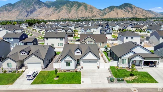 View of mountain backdrop featuring nearby suburban area | Image 33