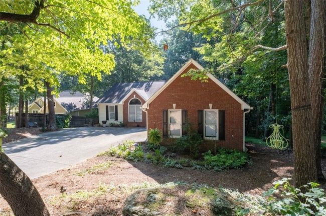 2030 Buford Dam Rd, House other with 3 bedrooms, 2 bathrooms and 2 parking in Buford GA | Image 4
