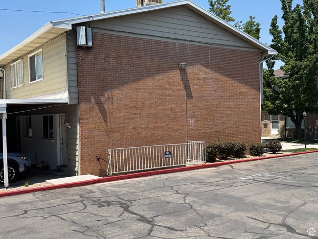 View of building accross the parking lot where the storage area is | Image 38