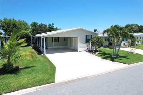 1068 Wren Cir, Barefoot Bay, FL, 32976-7511 | Card Image