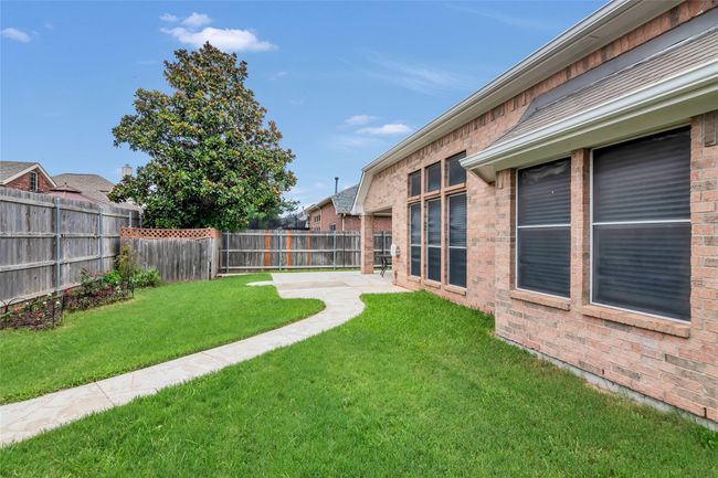 View of fenced backyard | Image 39