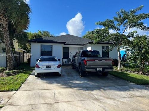141 W 16th St, Riviera Beach, FL, 33404-6113 | Card Image