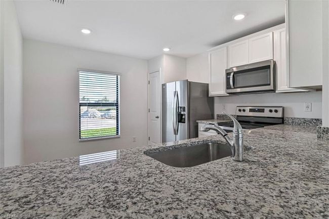 869 General Chesty Puller Ct, House other with 3 bedrooms, 2 bathrooms and 2 parking in LABELLE FL | Image 6