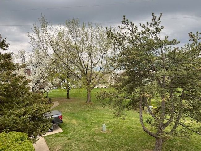 BALCONY VIEW TO LEFT & THE WALKWAY GOES TO GARAGE | Image 13