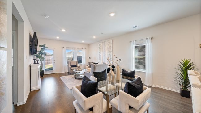 Living area featuring dark wood-type flooring and recessed lighting | Image 10