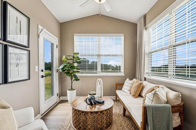 Photo is of the actual model. Imagine having a cup of coffee in your new sun room. | Image 7