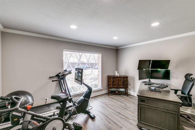 This room was original living room in the home and now functions as office and workout room for current owner but it does have a small closet so could be a 5th bedroom, playroom, game room, craft room. | Image 11