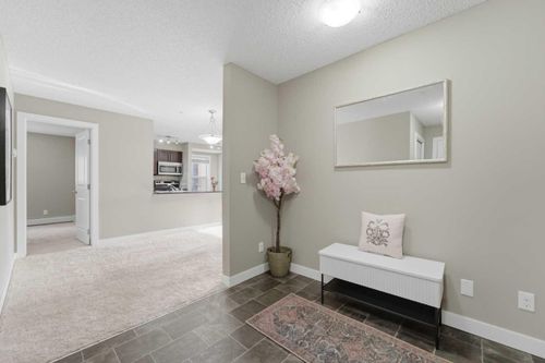 8201-403 Mackenzie Way, Airdrie, AB, T4B3V7 | Card Image