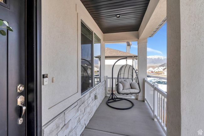 Balcony featuring a mountain view | Image 25