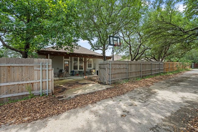 Rear view of house featuring a patio | Image 32