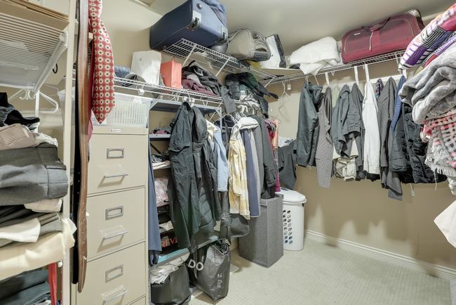 Walk in closet featuring carpet floors | Image 26