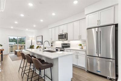 Light and bright kitchen with oversized island | Image 2