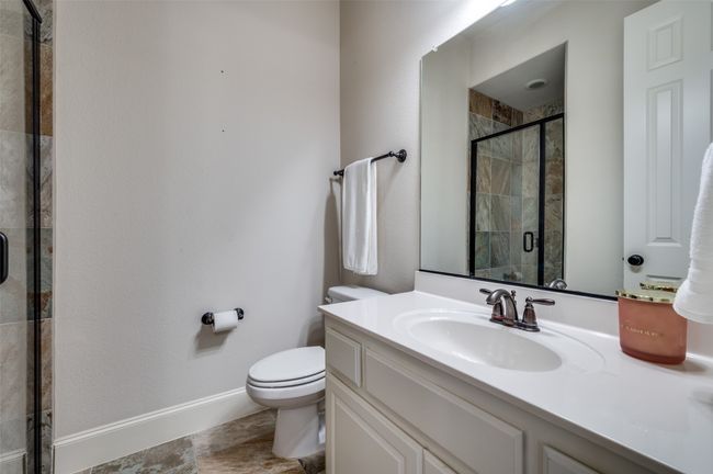 Full bathroom featuring vanity and a stall shower | Image 31