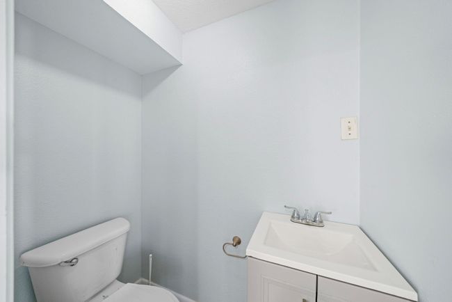 Half bath off the left side of the property entrance. | Image 19