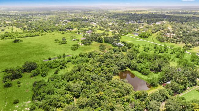 View from the back left side of the property showing the full potential of this rare find peace of Heaven! | Image 7