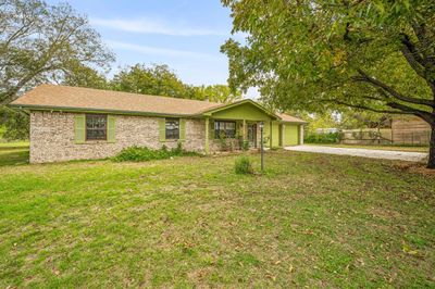 701 N Travis Street, House other with 4 bedrooms, 2 bathrooms and null parking in De Leon TX | Image 2