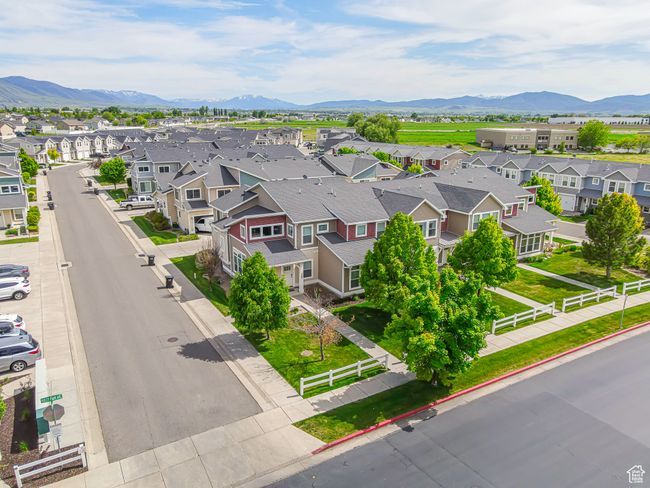 Aerial view of residential area featuring a mountain backdrop | Image 22