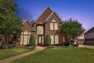 Elegant 5BR/5BA brick residence offering spacious luxury and timeless design. | Image 1