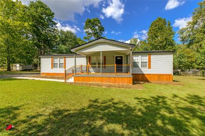 Manufactured / mobile home with a front lawn and covered porch | Image 3