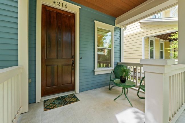 Welcoming porch and front door. Great area to hang out with friends and neighbors. | Image 6