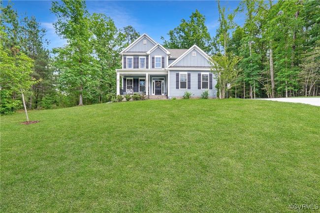 Classic two-story home with inviting porch and spacious lot. | Image 34