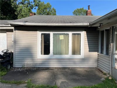 View of side of home featuring a patio | Image 3