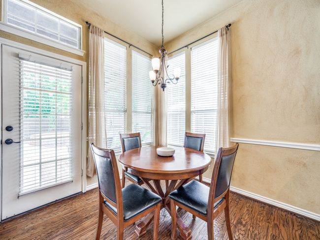 Dining space featuring , wood finished floors, healthy amount of natural light. | Image 11