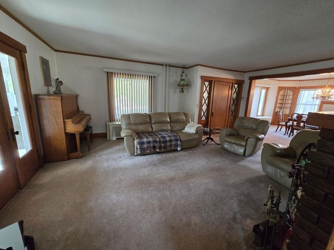 Spacious carpeted living room | Image 5