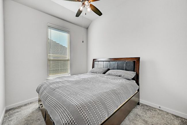 With ample closet space and neutral tones, the guest bedrooms provide a welcoming atmosphere for family and friends. | Image 20