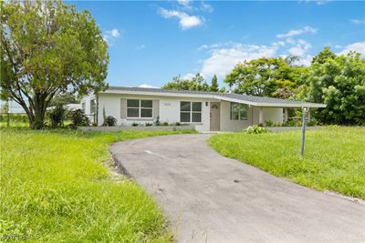 Single story home with a front yard | Image 3