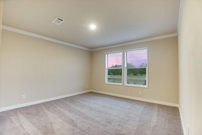 Unfurnished room with crown molding, carpet, and baseboards | Image 21