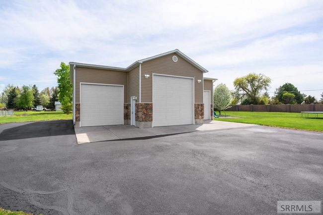 3902 E 154 N, House other with 5 bedrooms, 4 bathrooms and 7 parking in Rigby ID | Image 76