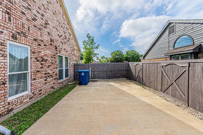 View of patio / terrace featuring a gate | Image 32
