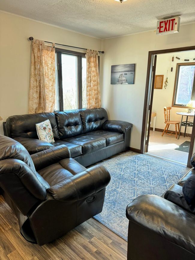 8288 Portage St, House other with 4 bedrooms, 3 bathrooms and null parking in Onekama MI | Image 6